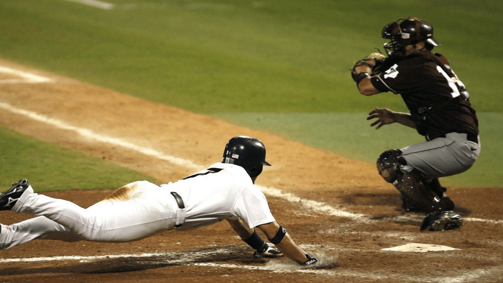 Baseball playing on field